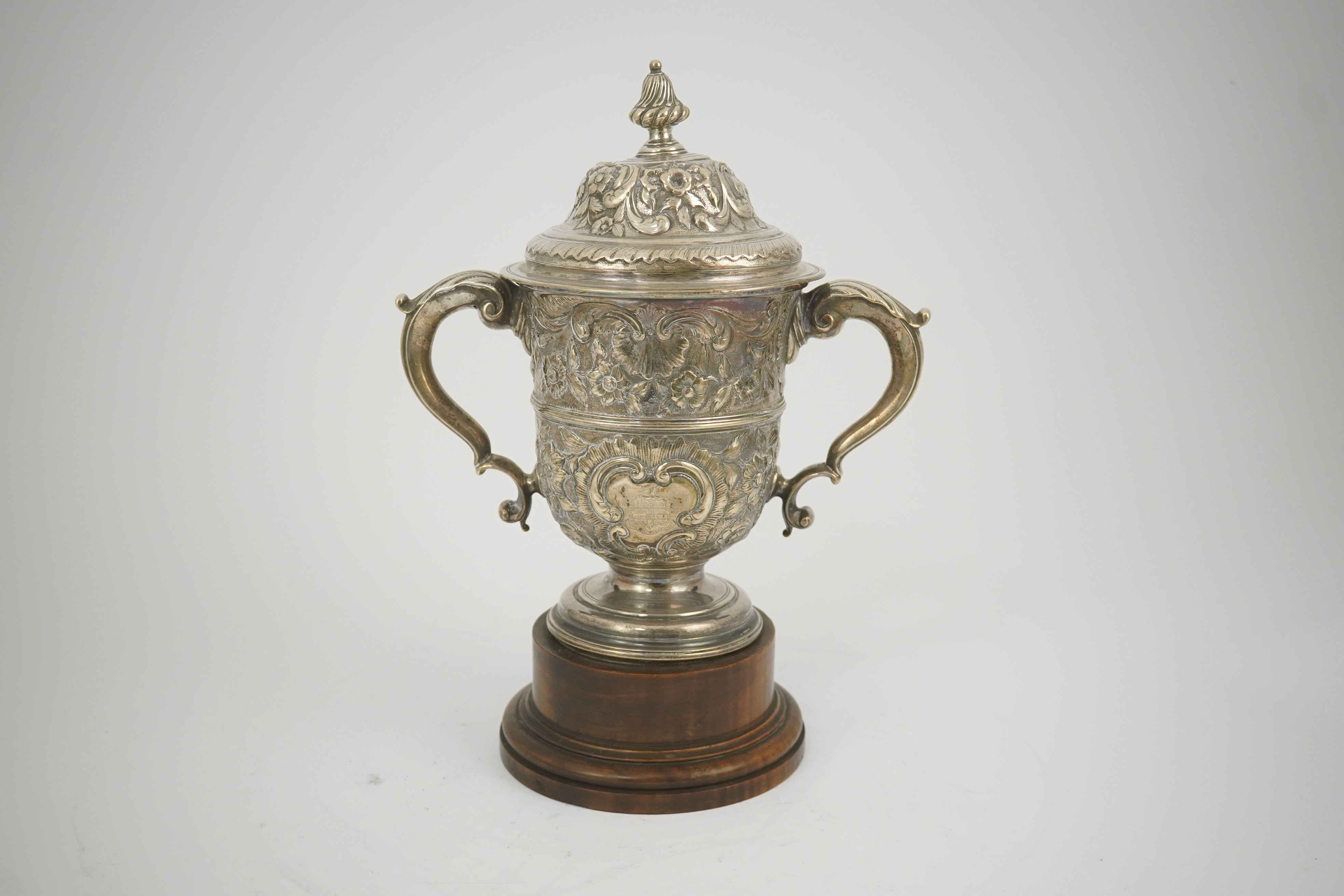 A George II silver loving cup with later floral embossed decoration, maker's initials RI, London, 1745